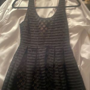 (2) size Small dresses for $20.00
